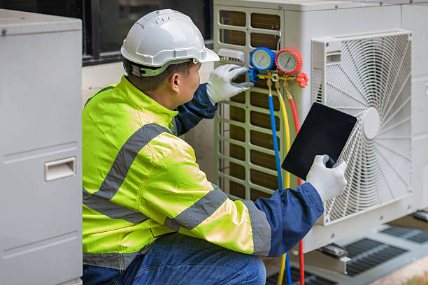 Professional Air Duct Cleaning technician working in Midland, TX